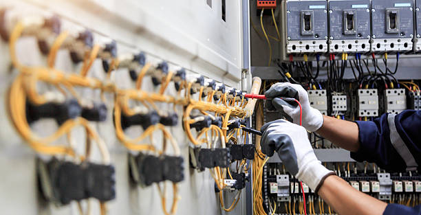 Professional Electrical Panel Upgrade technician working in Pettis County County, MO